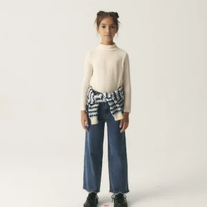 Top de niña con cuello alto blanco
