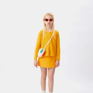 Cárdigan de niña evasé amarillo