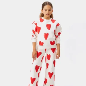 Pantalón unisex estampado corazones