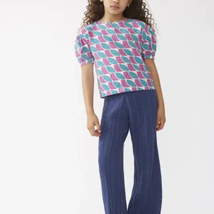 Top de niña estampado de plumas