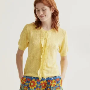 Cárdigan punto floral amarillo con volantes