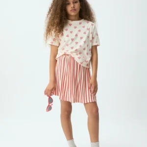 Falda corta de niña con estampado de rayas rojas