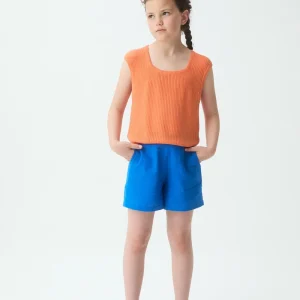 Top punto naranja manga corta de niña