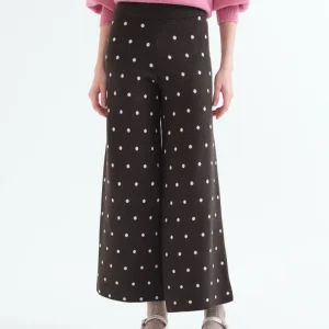 Pantalón verde con estampado de puntos blancos pequeños