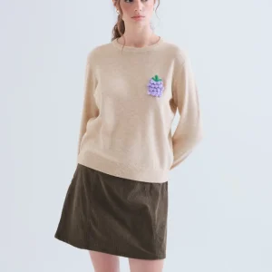 Jersey punto beige con detalle de uva