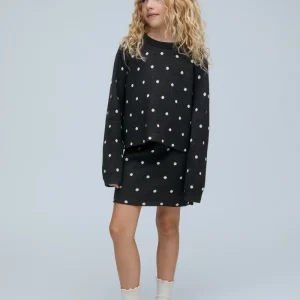 Falda corta de niña con estampado de puntos mini verde