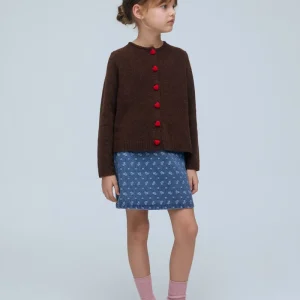 Falda corta vaquera de niña con estampado de corazones