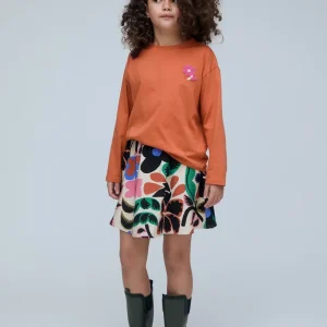 Camiseta de niña 100% algodón con aplique de flor rosa