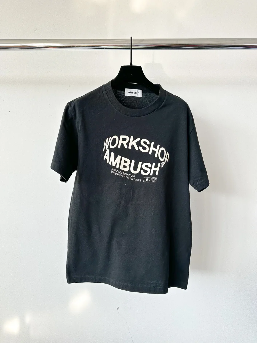 AMBUSH Workshop Black Revolve Logo T-Shirt - Imagen 5