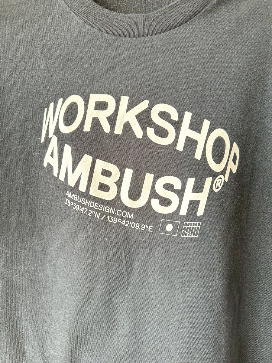 AMBUSH Workshop Black Revolve Logo T-Shirt - Imagen 9