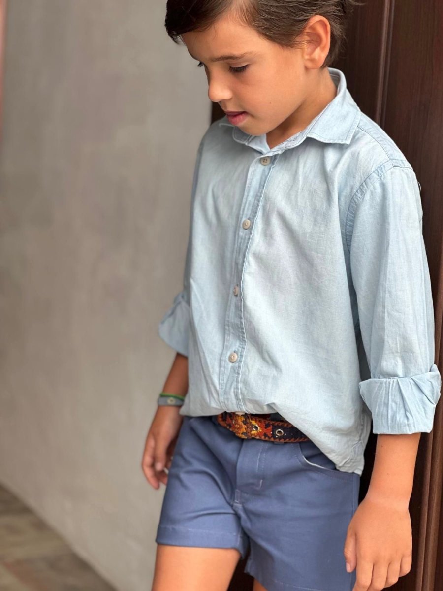 Pantalón corto azul de niño
