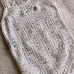 Body tirantes perlé