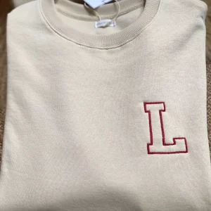 Sudadera Beig inicial adulto